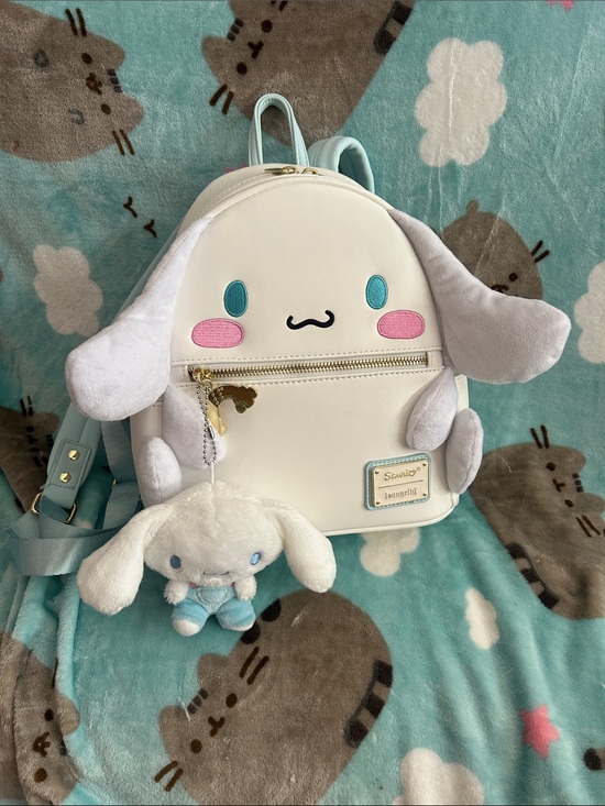 cinnamoroll backpack mini Sanrio Synthetic Leather The Cinnamoroll Rosy Cheeks Mini Backpack is a super soft plush companion featuring Cinnamorolls long ears Loungefly Sanrio Cinnamoroll Balloons Mini